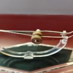 Twin tuck dental brace holder